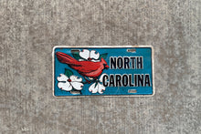 Load image into Gallery viewer, North Carolina Booster License Plate Vintage Blue NC State Bird Wall Decor
