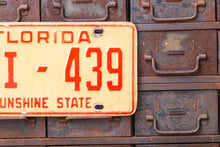 Load image into Gallery viewer, Florida 1975 Dealer License Plate Sunshine State Vintage Wall Decor - Eagle&#39;s Eye Finds
