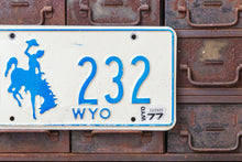Load image into Gallery viewer, Wyoming 1977 License Plate Vintage White and Blue Wall Decor - Eagle&#39;s Eye Finds
