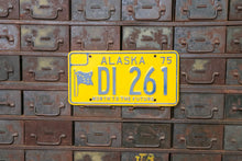 Load image into Gallery viewer, 1975 Alaska License Plate Vintage Yellow Decor DI261
