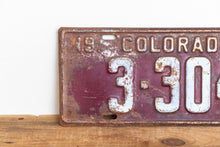 Load image into Gallery viewer, Colorado 1942 License Plate Vintage Maroon Wall Hanging Decor - Eagle&#39;s Eye Finds
