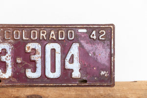 Colorado 1942 License Plate Vintage Maroon Wall Hanging Decor - Eagle's Eye Finds