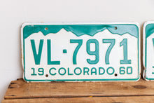 Load image into Gallery viewer, Colorado 1960 License Plate Pair Vintage White CO Wall Hanging Decor - Eagle&#39;s Eye Finds
