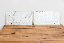 Load image into Gallery viewer, Colorado 1960 License Plate Pair Vintage White CO Wall Hanging Decor - Eagle&#39;s Eye Finds
