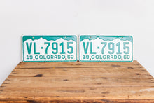 Load image into Gallery viewer, Colorado 1960 License Plate Pair Vintage Green and White CO Wall Hanging Decor VL-7915 - Eagle&#39;s Eye Finds
