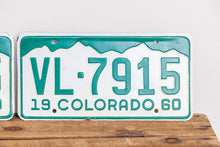 Load image into Gallery viewer, Colorado 1960 License Plate Pair Vintage Green and White CO Wall Hanging Decor VL-7915 - Eagle&#39;s Eye Finds
