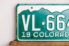 Load image into Gallery viewer, Colorado 1962 License Plate Pair Vintage NOS Green CO Wall Hanging Decor - Eagle&#39;s Eye Finds
