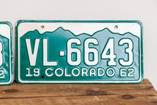 Load image into Gallery viewer, Colorado 1962 License Plate Pair Vintage NOS Green CO Wall Hanging Decor - Eagle&#39;s Eye Finds
