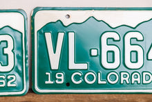 Load image into Gallery viewer, Colorado 1962 License Plate Pair Vintage NOS Green CO Wall Hanging Decor - Eagle&#39;s Eye Finds
