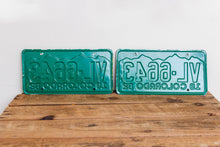 Load image into Gallery viewer, Colorado 1962 License Plate Pair Vintage NOS Green CO Wall Hanging Decor - Eagle&#39;s Eye Finds
