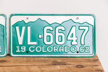 Load image into Gallery viewer, Colorado 1962 License Plate Pair Vintage Green CO Wall Hanging Decor - Eagle&#39;s Eye Finds
