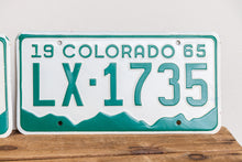 Load image into Gallery viewer, Colorado 1965 License Plate Pair Vintage White CO Wall Hanging Decor - Eagle&#39;s Eye Finds
