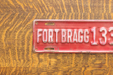 Load image into Gallery viewer, 1930s Fort Bragg North Carolina License Plate Topper Vintage NC
