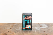 Load image into Gallery viewer, Holleb&#39;s Tea Tin Vintage Black Mid-Century Advertising Can - Eagle&#39;s Eye Finds
