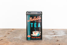 Load image into Gallery viewer, Holleb&#39;s Tea Tin Vintage Black Mid-Century Advertising Can - Eagle&#39;s Eye Finds
