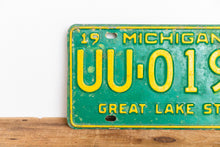 Load image into Gallery viewer, Michigan 1968 License Plate Vintage Wall Hanging Decor John Deere Colors - Eagle&#39;s Eye Finds

