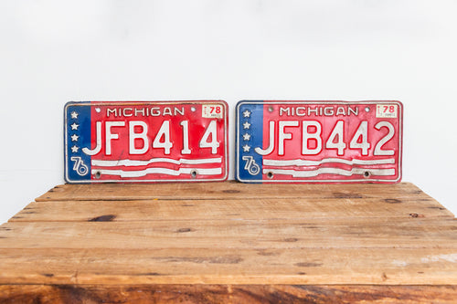 Michigan 1976 License Plate Pair Vintage USA Bicentennial Red White Blue Decor - Eagle's Eye Finds