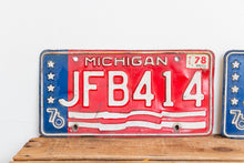 Load image into Gallery viewer, Michigan 1976 License Plate Pair Vintage USA Bicentennial Red White Blue Decor - Eagle&#39;s Eye Finds

