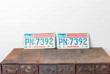 Load image into Gallery viewer, South Dakota 1976 License Plate Pair Vintage Bicentennial Collectibles - Eagle&#39;s Eye Finds
