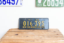 Load image into Gallery viewer, New York 1938 World&#39;s Fair Vintage Omnibus Taxi License Plate - Eagle&#39;s Eye Finds
