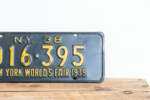 Load image into Gallery viewer, New York 1938 World&#39;s Fair Vintage Omnibus Taxi License Plate - Eagle&#39;s Eye Finds
