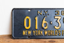Load image into Gallery viewer, New York 1938 World&#39;s Fair Vintage Omnibus Taxi License Plate - Eagle&#39;s Eye Finds
