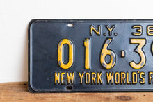 Load image into Gallery viewer, New York 1938 World&#39;s Fair Vintage Omnibus Taxi License Plate - Eagle&#39;s Eye Finds
