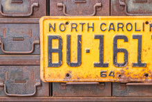 Load image into Gallery viewer, North Carolina 1964 License Plate Vintage Yellow Wall Hanging Decor - Eagle&#39;s Eye Finds
