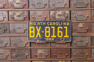 North Carolina 1965 License Plate Vintage Black Yellow Wall Hanging Decor - Eagle's Eye Finds