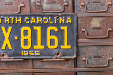 Load image into Gallery viewer, North Carolina 1965 License Plate Vintage Black Yellow Wall Hanging Decor - Eagle&#39;s Eye Finds
