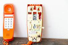 Load image into Gallery viewer, Orange Wall Phone Vintage ITT Bright Colored Retro Wall Decor - Eagle&#39;s Eye Finds
