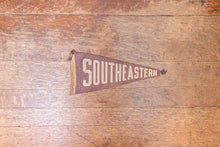 Load image into Gallery viewer, Southeastern Purple Felt Pennant Vintage High School Decor - Eagle&#39;s Eye Finds
