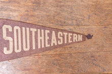 Load image into Gallery viewer, Southeastern Purple Felt Pennant Vintage High School Decor - Eagle&#39;s Eye Finds
