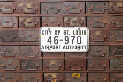 St. Louis Airport Authority Missouri Booster License Plate Vintage White Wall Hanging - Eagle's Eye Finds