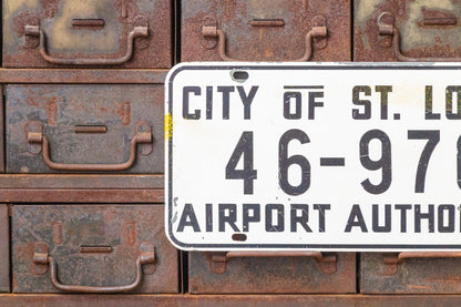 St. Louis Airport Authority Missouri Booster License Plate Vintage White Wall Hanging - Eagle's Eye Finds