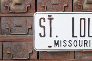 1960s St. Louis Missouri Booster License Plate Vintage White Wall Hanging Decor - Eagle's Eye Finds