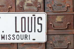1960s St. Louis Missouri Booster License Plate Vintage White Wall Hanging Decor - Eagle's Eye Finds