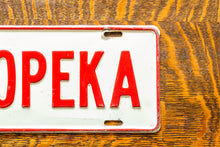 Load image into Gallery viewer, Topeka Kansas Booster License Plate Vintage Wall Decor
