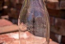 Load image into Gallery viewer, Minn Seal Vintage Milk Bottle Quart Sized - Eagle&#39;s Eye Finds
