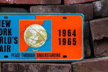 Load image into Gallery viewer, New York 1964 1965 World&#39;s Fair License Plate Vintage New York City Souvenir Booster Plate - Eagle&#39;s Eye Finds

