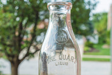 Load image into Gallery viewer, Minn Seal Vintage Milk Bottle Quart Sized - Eagle&#39;s Eye Finds
