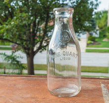 Load image into Gallery viewer, Minn Seal Vintage Milk Bottle Quart Sized - Eagle&#39;s Eye Finds
