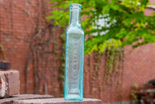 Load image into Gallery viewer, Hood&#39;s Sarsaparilla Vintage Aqua Apothecary Bottles from Lowell Massachusetts - Eagle&#39;s Eye Finds
