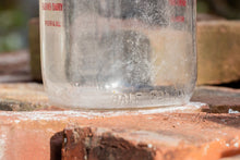 Load image into Gallery viewer, Meadow Brook Farms Dairy Vintage Embossed Glass Half Gallon Milk Bottle From Peoria IL - Eagle&#39;s Eye Finds
