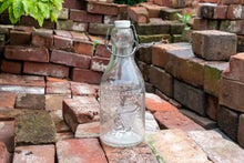 Load image into Gallery viewer, Thatcher&#39;s Dairy Milk Bottle Vintage Glass Milk Bottle with Wire Bail - Eagle&#39;s Eye Finds
