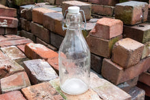 Load image into Gallery viewer, Thatcher&#39;s Dairy Milk Bottle Vintage Glass Milk Bottle with Wire Bail - Eagle&#39;s Eye Finds
