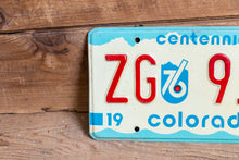 Load image into Gallery viewer, Aspen Colorado License Plate Vintage 1975 ZG CO Centennial Wall Decor - Eagle&#39;s Eye Finds
