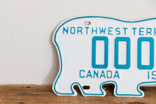 Load image into Gallery viewer, Northwest Territories 1971 Sample License Plate Polar Bear NWT Canada Vintage Wall Hanging Decor - Eagle&#39;s Eye Finds
