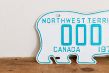 Load image into Gallery viewer, Northwest Territories 1975 Sample License Plate Polar Bear NWT Canada Vintage Wall Hanging Decor - Eagle&#39;s Eye Finds
