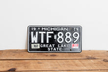 Load image into Gallery viewer, WTF Michigan 1979 Great Lake State License Plate Vintage Wall Hanging Decor - Eagle&#39;s Eye Finds
